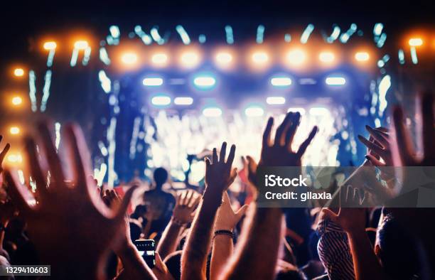 Large Group Of People At A Concert Party Stock Photo - Download Image Now - Music Festival, Crowd of People, Performance