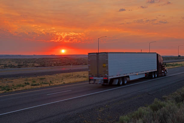 istock Sunrise over desert highway 1329412034