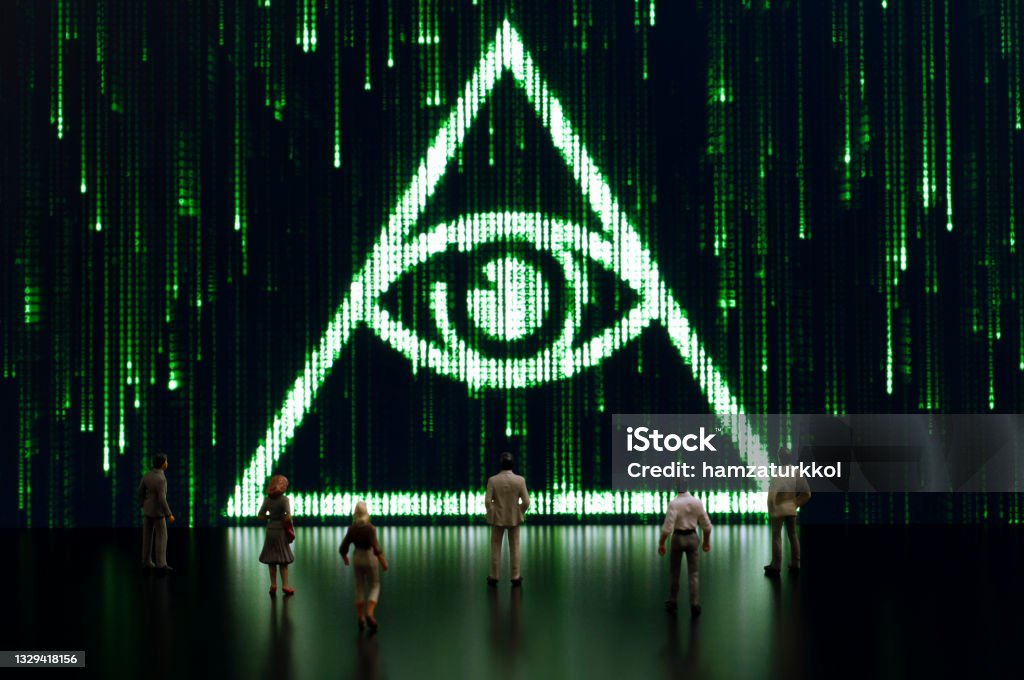 Matrix: All seeing eye Businessman/politician figurines examine a matrix style illuminati symbol. Artificial intelligence/technology/digital age concept Illuminati Stock Photo
