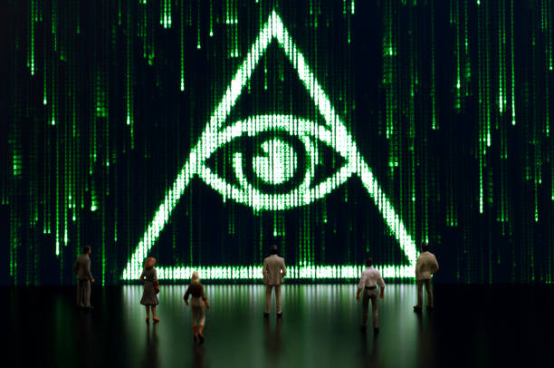 Matrix: All seeing eye Businessman/politician figurines examine a matrix style illuminati symbol. Artificial intelligence/technology/digital age concept masonic symbol stock pictures, royalty-free photos & images