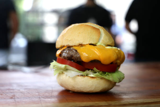 istock cheese salad burger on a wooden background 1329418879