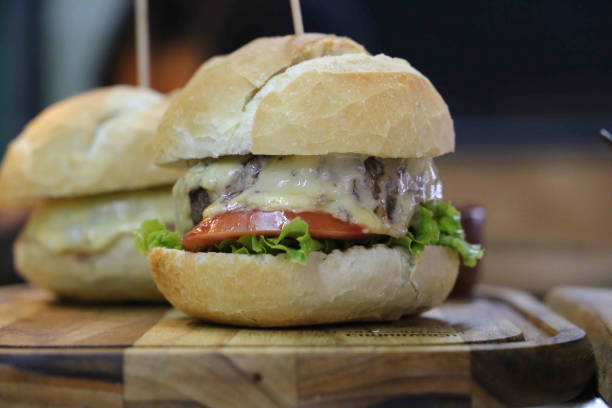 istock X-Salada. Brazilian hamburger made in barbecue grill 1329420792