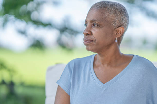 istock Pensive older woman with short hair 1329424813