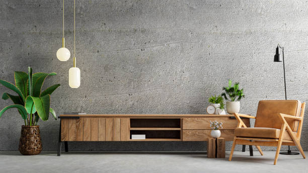 living room interior have cabinet for tv and leather armchair in cement room with concrete wall. - office bookshelf stok fotoğraflar ve resimler