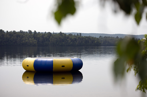 Floating Trampoline on water during Summertime