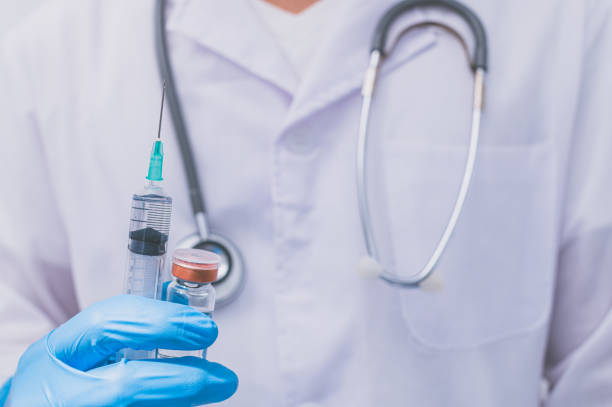 istock The doctor is using a vaccine to prevent germs. 1329433416