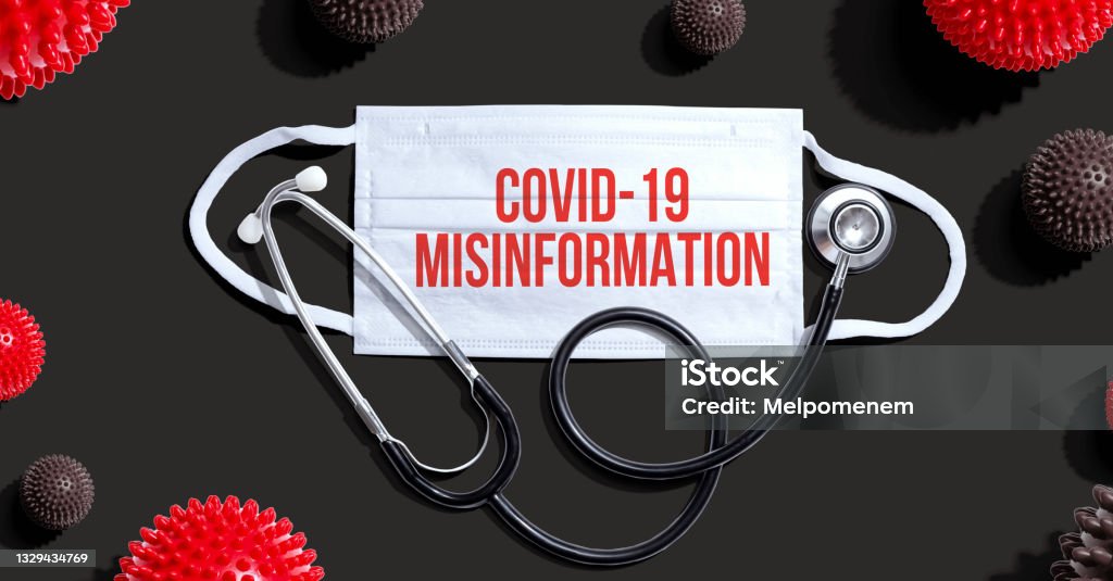 Covid-19 Misinformation theme with mask and stethoscope Covid-19 Misinformation theme with medical mask and stethoscope Misinformation Stock Photo