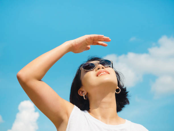 woman in summertime. - sun sunlight women summer imagens e fotografias de stock