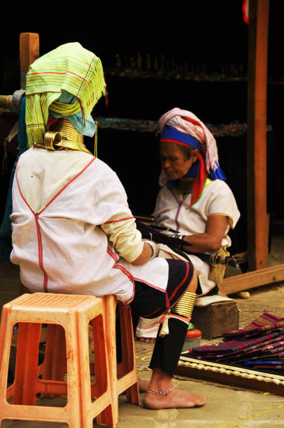 Kayan Lahwi women ethnic groups of Kayah State of Karen people wear the brass neck rings in Long neck village Kayan Lahwi women ethnic groups of Kayah State of Karen people wear the brass neck rings in Long neck village for travelers travel at Bagan or Pagan on February 3, 2013 in Mandalay, Myanmar or Burma kayan neck rings stock pictures, royalty-free photos & images