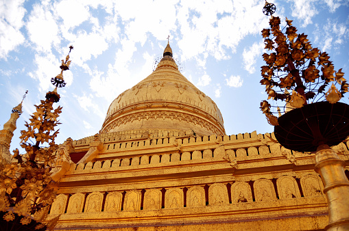 Shwezigon Pagoda Paya pagoda chedi temple for burmese people and foreign traveler travel visit respect praying in Nyaung U town at Bagan or Pagan ancient heritage city in Mandalay of Myanmar or Burma