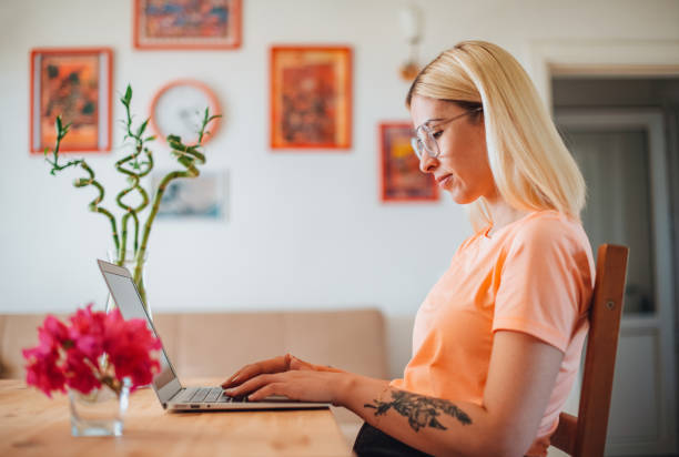 istock Young Woman Working From Home 1329446378