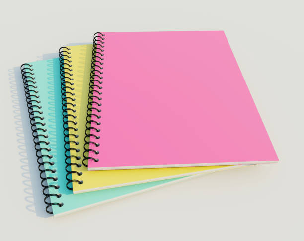 istock Colourful stacked spiral binder notebooks. Blank notebooks. Side view. 1329450629