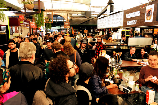 FREMANTEL, WA -JULY 18 2021:Crowed of people visiting at Fremantle Markets. Built in 1897, it houses over 150 shops for fresh food producers, vegetable growers and food retailers in The Yard.