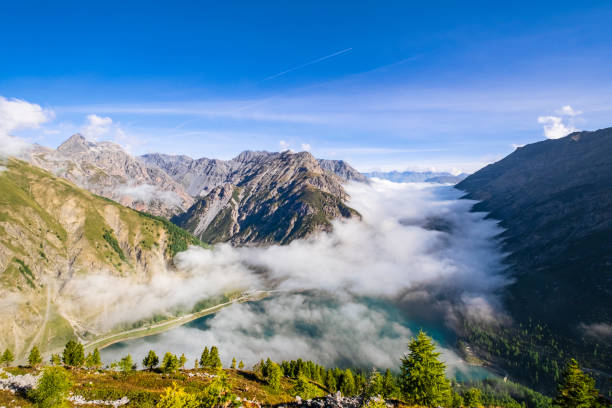 Lago del Gallo, or Lake of Livigno, as seen (or not seen) from above under the clouds