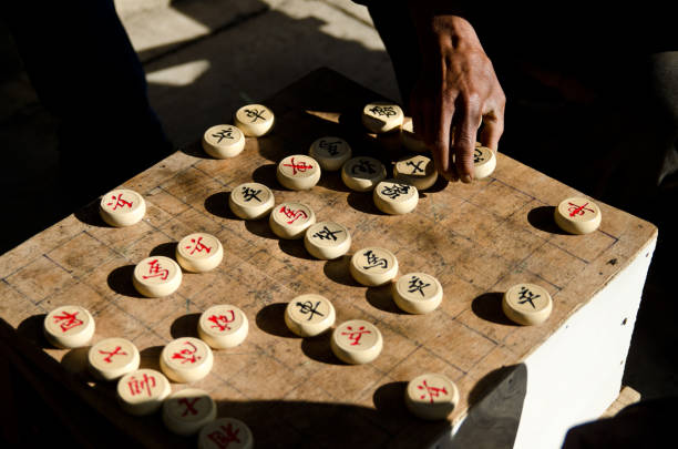 istock Men play Chinese Chess outdoor 1329460356
