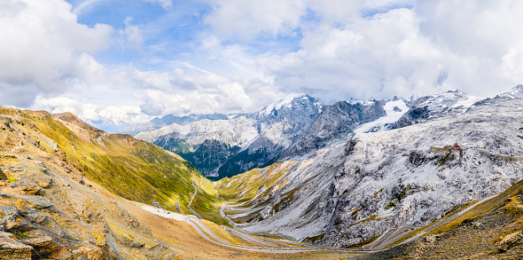 Hairpin bends on the Stelvio Pass (Italian: Passo dello Stelvio), a mountain pass in northern Italy bordering Switzerland at an elevation of 2,757 m (9,045 ft) above sea level. (6 shots stitched)