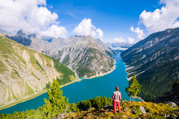 Admiring Lago del Gallo, the Lake of Livigno, from above