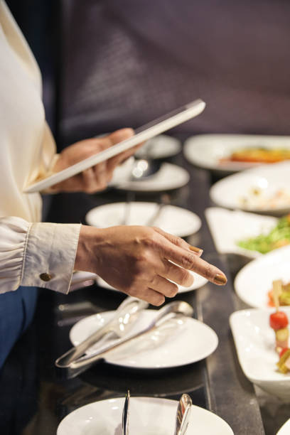istock Restaurant Manager Checking Food Readiness 1329460859