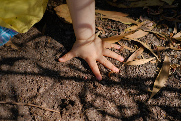 istock Baby with his hand on the ground 1329460942