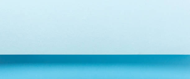 istock Colorful blue folded paper material design horizontally. Top view, flat lay. Banner 1329461780