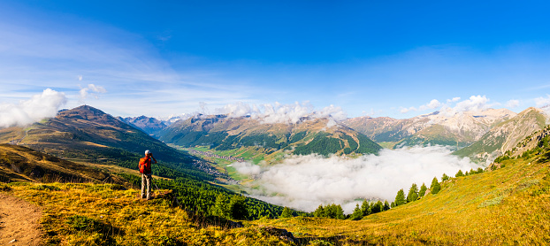 Photographing Livigno and its valley from above (4 shots stitched)