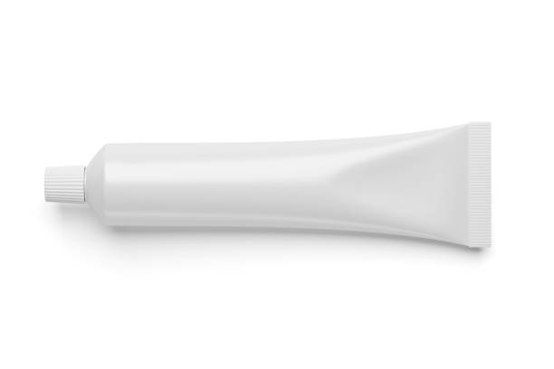 白で分離された白い化粧品の管を空白。 - toothpaste ストックフォトと画像
