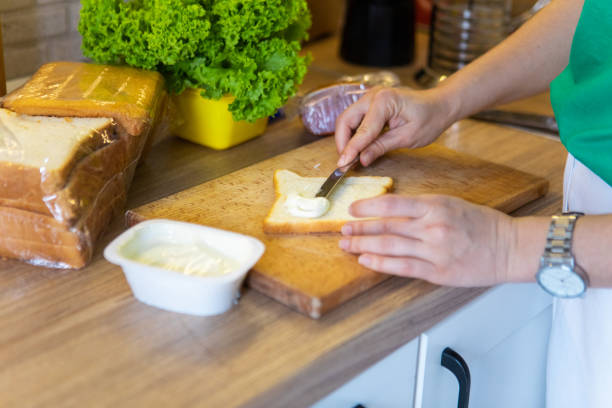 istock making morning sandwich at home kitchen 1329474095