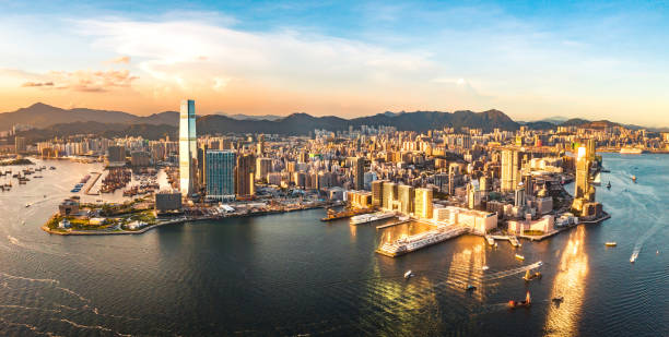 Drone view of Hong Kong city, sea, kowloon city and Hong kong harbor Drone view of Hong Kong city, sea, kowloon city and Hong kong harbor kowloon stock pictures, royalty-free photos & images