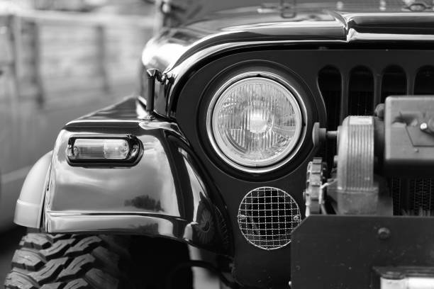 front view parked of black old  jeep off-road vehicle - jeep stockfoto's en -beelden