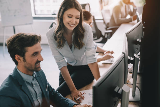 istock Startup business people group of programmer working as team to find solution to problem 1329481316
