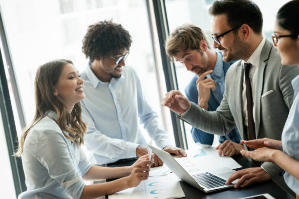 istock Happy diverse business colleagues meeting, working in modern office 1329481355