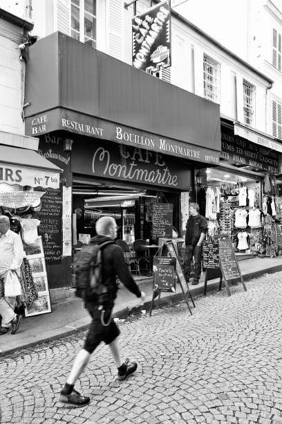 PARIS - JULY 22: Tourists visit Rue de Steinkerque on July 22, 2011 in Paris, France. The street is one of most famous shopping areas in Monmartre district. Paris is the most visited city worldwide.