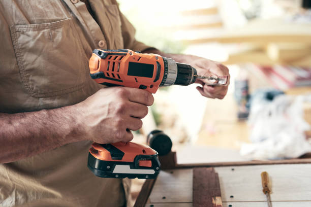 istock Man assembling furniture and fixing it - hobby concept. 1329484939