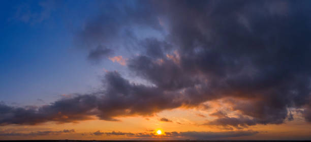 istock Dawn or sunset over the clouds, blue hour, aerial view. 1329485530