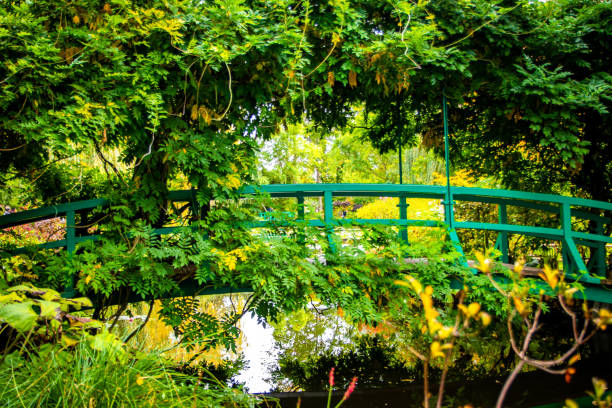 Bridge at the Garden of Claude Monet in Giverny, France A photo of Claude Monets' famous bridge that inspired some of his most famous art. giverny stock pictures, royalty-free photos & images