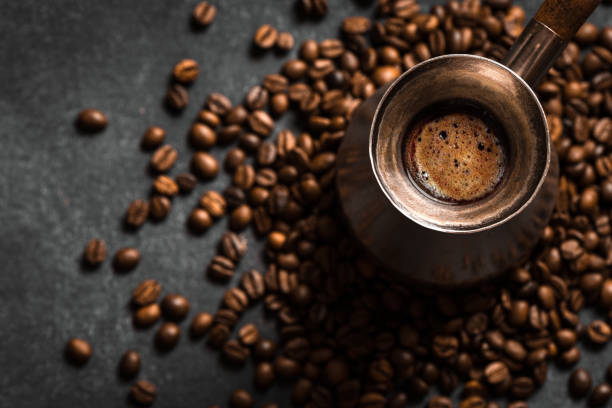 istock Hot coffee in turk and coffee beans 1329487238