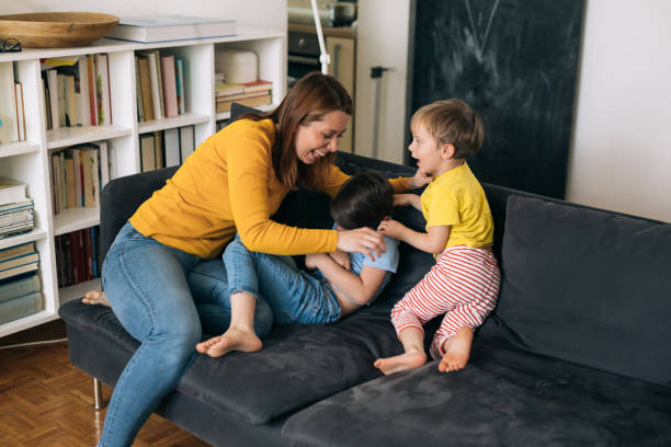 istock mother with kids at home 1329488828
