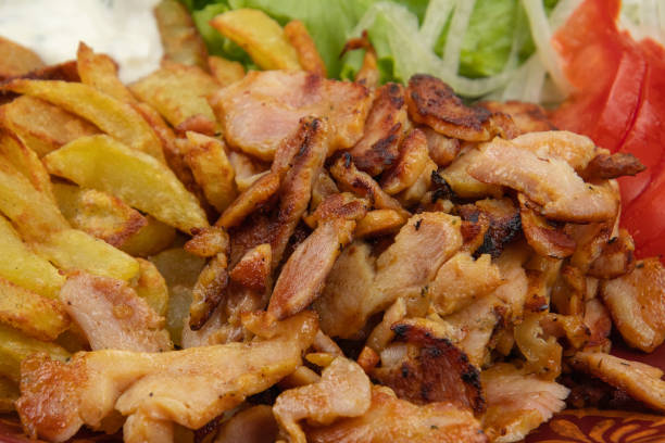 istock kebab plate, salad, tomatoes, onions and fries 1329490599