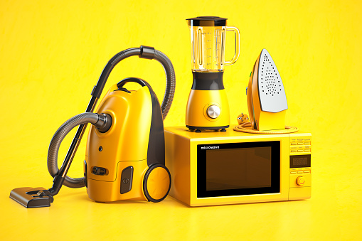 Yellow household appliances on yellow background. Set of home  technics. 3d illustration