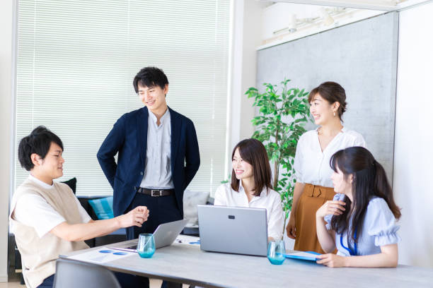 istock Business persons having a meeting 1329494403