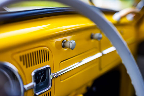 istock Restored yellow classic car interior. 1329497133