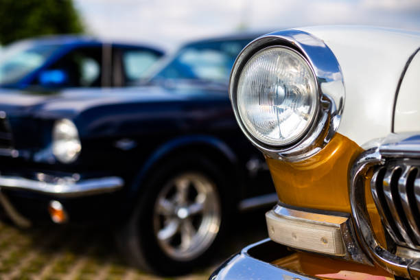istock Chrome plated front lamp of a restored classic car. 1329497355