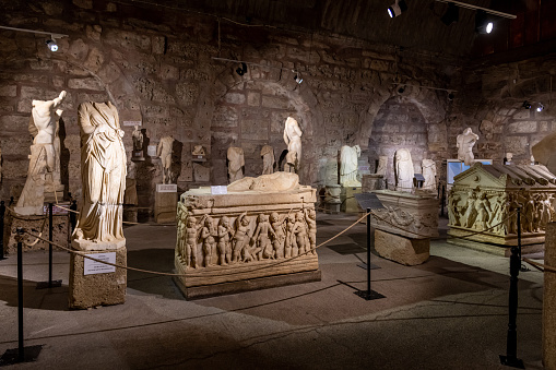 Antalya, Turkey - July 18, 2021: Sculptures and Ancient ruins in the Side Archeology Museum, Antalya, Turkey.