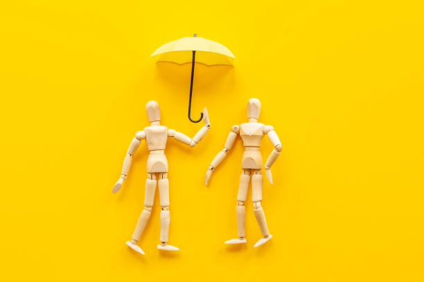 istock Connection couple - two wooden mannequin figurine communication 1329499112