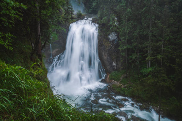 istock The Gollinger waterfall in Austria on rainy day 1329499742
