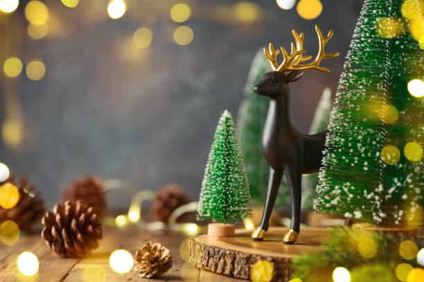 istock Christmas decorations on wooden table with bokeh lights and copy space 1329500566
