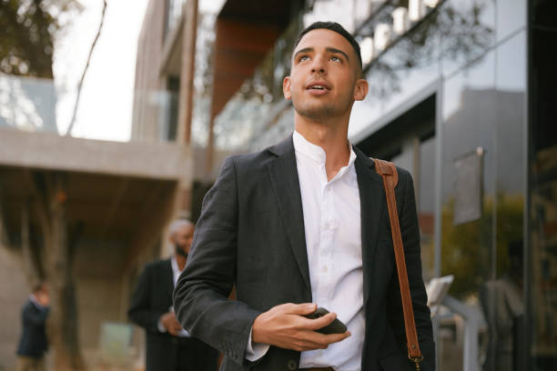 istock Dreamy young businessman 1329501380
