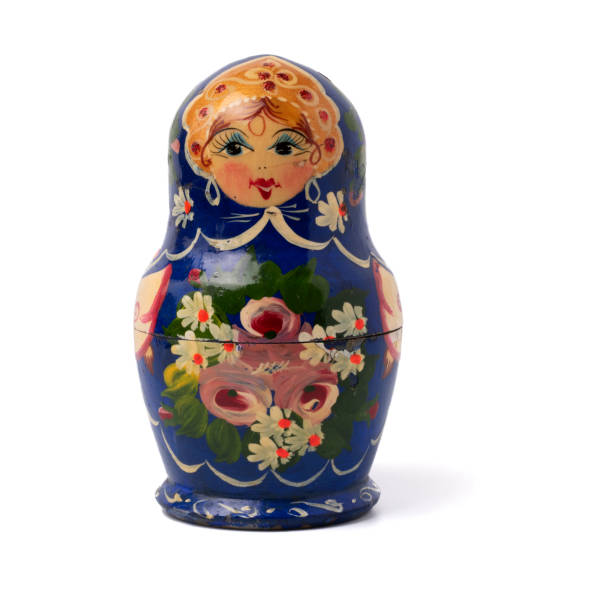 istock Russian traditional blue wooden nesting doll Babushka (matryoshka) isolated on white background. 1329504760