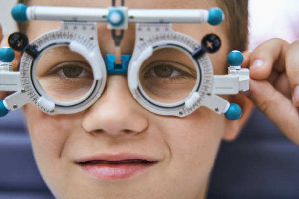 istock Adorable little boy wearing optical trial lens frame 1329505066