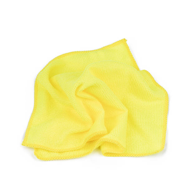 istock microfiber towel cloth isolated on white background. fabric for dusting and cleaning cut out 1329506033